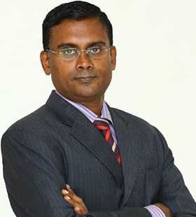 Dr Arul K